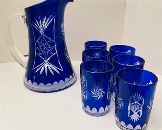 $70   •  #49.  Cobalt blue cut crystal serving set • 1 pitcher 6 glasses  
