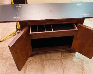 $222 •  #21.  Thomasville rolling buffet server cabinet  • 33high 38wide 18deep 76extended