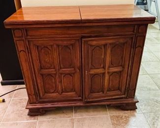 $222 •  #21.  Thomasville rolling buffet server cabinet  • 33high 38wide 18deep 76extended