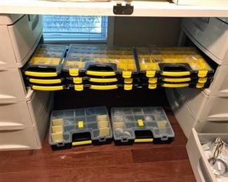 Cases filled with beads and findings for jewelry making