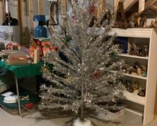 One of 9 silver trees of different sizes along with tree turners and color wheels. More for Part II sale also!!