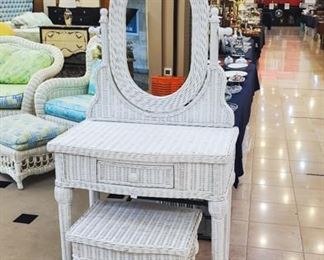 White wicker vanity and stool.