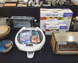 George Foreman, Seal-A-Meal, toaster oven, pottery, etc.