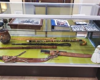 Coin collection, Lladra First Communion, hand carved walking sticks, canes, etc.