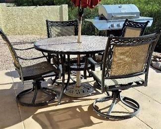 Patio table and swivel rocker chairs