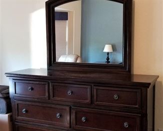 Dresser and mirror matches the sleigh bed