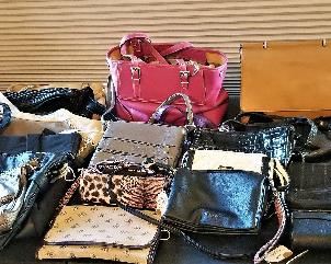 Lots of purses and designer purses