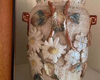 One of a pair of sand art vases