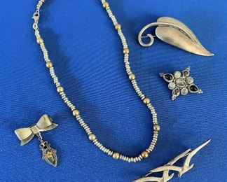 Many sterling pieces of jewelry