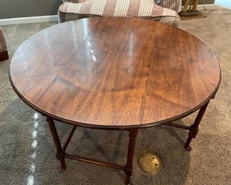 Drop-leaf coffee table by Baker