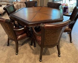 Leather top game table with six chairs