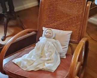 cained bent wood rocking chair and repro Bye-lo doll