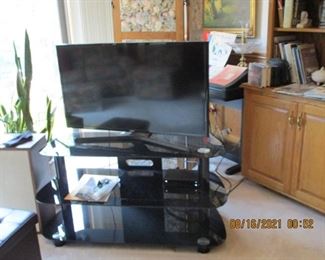 tv with entertainment stand