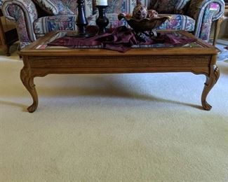 Wooden coffee table w/ glass top