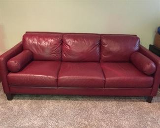 Red leather sofas , two