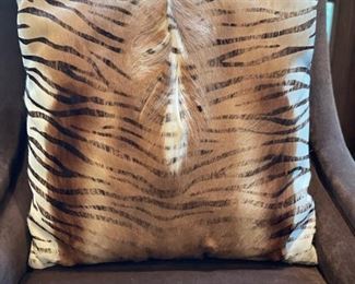 Faux tiger stencil on hide throw pillow. 