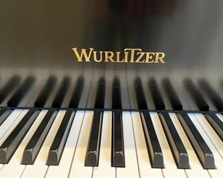 Wurlitzer ebony baby grand piano and bench. Photo 1 of 4. 