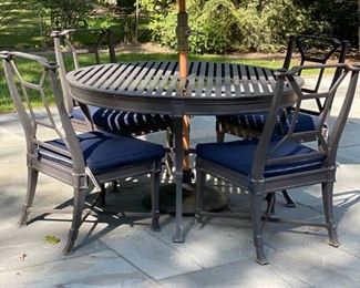 Restoration Hardware wrought iron dining table with four chairs. Seat cushions and umbrella included. Photo 2 of 3. 