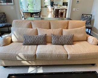 Three-seat Drexel Heritage sofa upholstered in a natural fiber indoor-outdoor fabric. Measures 94" W x 50" D x 19" H.