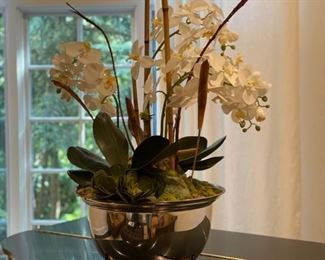 Silver-plate revere bowl with faux orchid arrangement. 