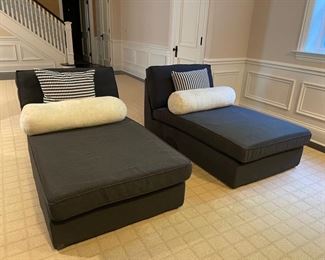 Pair of Ikea navy-blue upholstered chaise loungers. Sold with accent pillows and bolsters. 