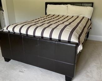 Room & Board Queen leather bed frame. Bedding and mattress set sold separately. Photo 1 of 3. 