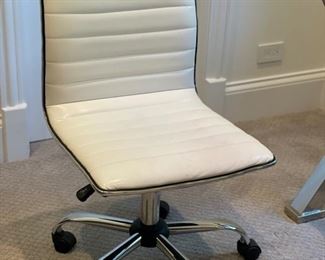 White leather upholstered office chair. 