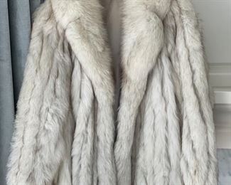 White fox fur coat. 