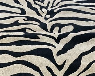 Wool zebra print rug. Measures 5' 3" x 7' 3". 