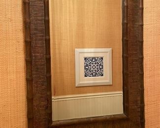 Faux bamboo and rattan mirror. Measures approximately 24" x 18". Photo 1 of 2. 