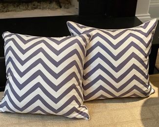 Pair of two down-filled chevron pattern pillows. 