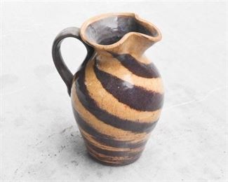 83. Glazed Potter Pitcher