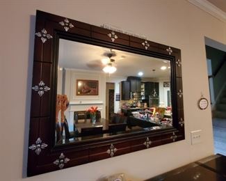 Wall mirror with floral detail