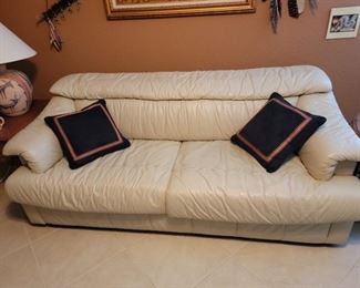 $500 Castro Convertible's Cream Leather Pull out Sofa, Queen Mattress. 