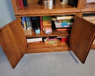 Cabinet Shelf is not adjustable. 9" between Shelves. 18" tall 15" wide