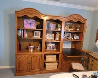$1,000 Thomasville wall unit storage with desk, 3 drawers, 1 cabinet with shelf and all shelves are adjustable.  Paid $2,000. Or make an offer.