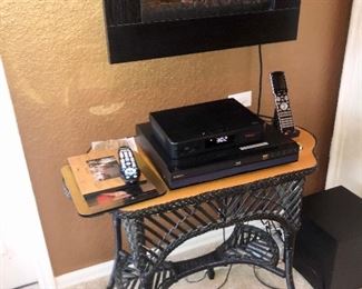 Wicker Table  and Wall Fireplace