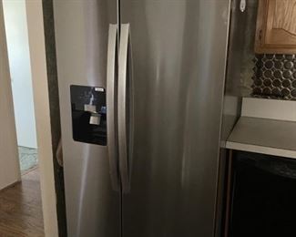 Whirlpool Stainless Side by Side Refrigerator. With in door ice and water service