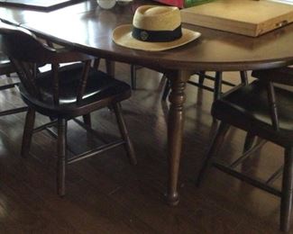 Ethan Allen Drop-Leaf Dining Table with 3 Leaves and 8 Master Craft Chairs.