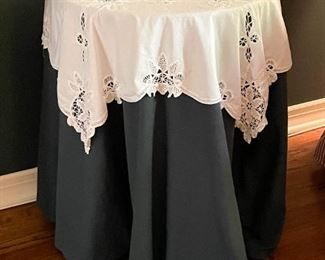 Round Accent Table with Layered Tablecloths