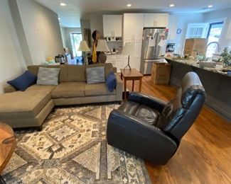 Very nice sofa chair and rug