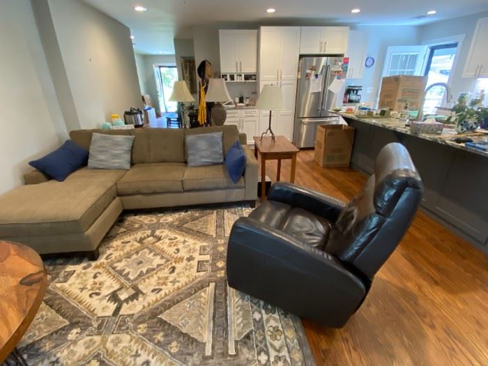 Very nice sofa chair and rug