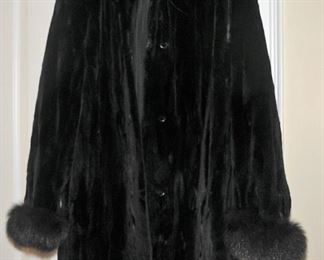 ONEOF THREE FUR COATS