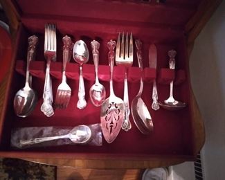 Silverplate; 8 -- 4 pc. pl. settings PLUS extra teaspoons, tablespoons & serving pieces. Three sets of silverplate available.