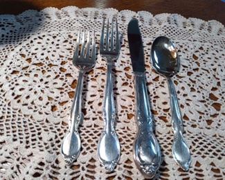 Silverplate; 8 -- 4 pc. pl. settings PLUS 5 tablespoons. Three sets of silverplate available.
