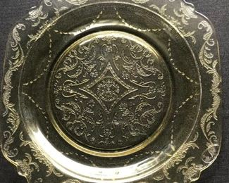 Close-up of Madrid Amber Depression Glass plate.