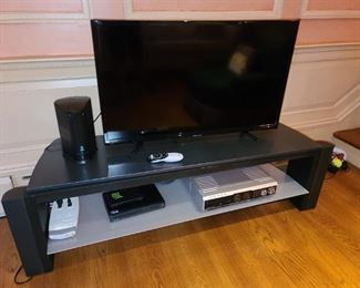 TV With TV Stand And Equipment