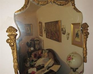 Ornate mirror with cameo