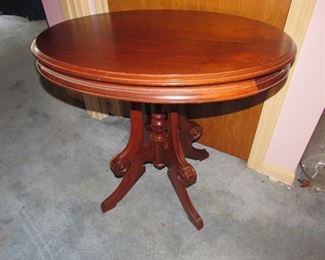 One of two matching Victorian parlor tables