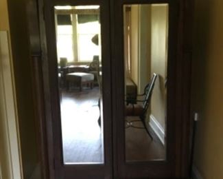 Apologies for poor picture quality. This beautiful antique wardrobe is solid tiger oak and uses slides for easy disassembling and reassembling. 